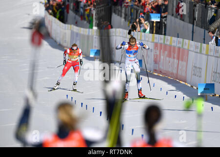 Seefeld, Österreich. 28. Februar, 2019. Beenden Stina Nilsson (SWE) vor Therese Johaug (NOR), Aktion, Endspurt. Cross country Damen 4 x 5 km Staffel Classic/Kostenlos, Langlauf Frauen Relais Classic/Freestyle FIS Nordische Ski-WM 2019 in Seefeld/Österreich vom 19.02.-03.03.2019. | Verwendung der weltweiten Kredit: dpa Picture alliance/Alamy leben Nachrichten Stockfoto