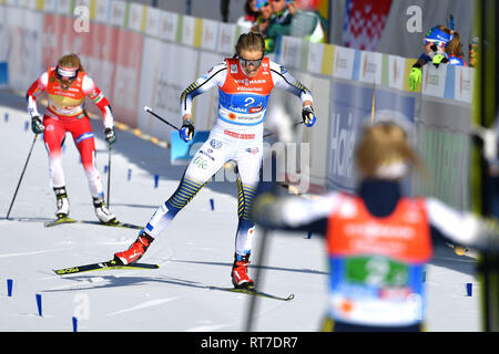 Seefeld, Österreich. 28. Februar, 2019. Beenden Stina Nilsson (SWE) vor Therese Johaug (NOR), Aktion, Endspurt. Cross country Damen 4 x 5 km Staffel Classic/Kostenlos, Langlauf Frauen Relais Classic/Freestyle FIS Nordische Ski-WM 2019 in Seefeld/Österreich vom 19.02.-03.03.2019. | Verwendung der weltweiten Kredit: dpa Picture alliance/Alamy leben Nachrichten Stockfoto