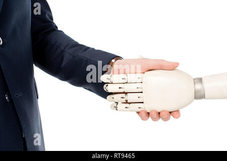 7/8-Ansicht von professionellen Geschäftsmann Händeschütteln mit Roboter isoliert auf weißem Stockfoto