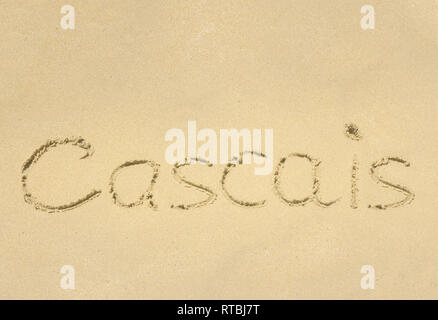 Inschrift auf nassem Sand Cascais. Stockfoto