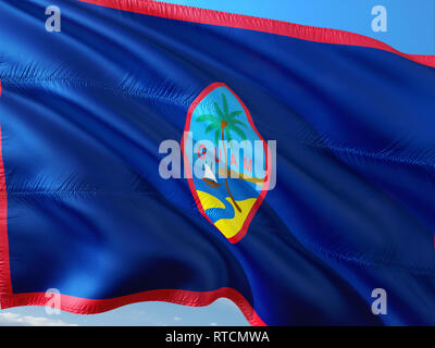 Flagge von Guam winken im Wind gegen den tiefblauen Himmel. Hochwertige Qualität aus. Stockfoto