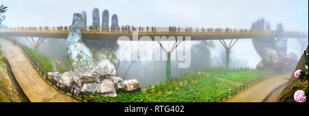 Die Goldene Brücke, die von zwei riesigen Händen unterstützt, in Vietnam. Stockfoto