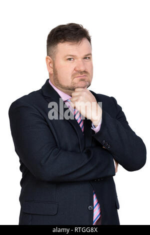 Erwachsenen Mann in einem strengen Anzug mit Krawatte mit einer ordentlichen Bart. Isolierte Hintergrund. Stockfoto