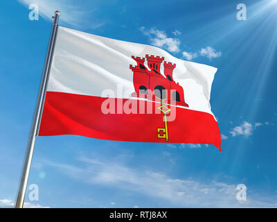 Gibraltar Nationalflagge Winken auf der Pole gegen Sonne und blauer Himmel. High Definition Stockfoto