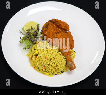 Durban Stil Huhn mit Reis Porto Stockfoto