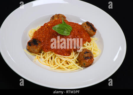 Spaghetti mit hackbällchen und Tomatensauce. Stockfoto