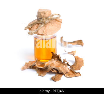 Partitionierung der Nussbaum mit pharmazeutischen Flasche. auf weißem Hintergrund Stockfoto