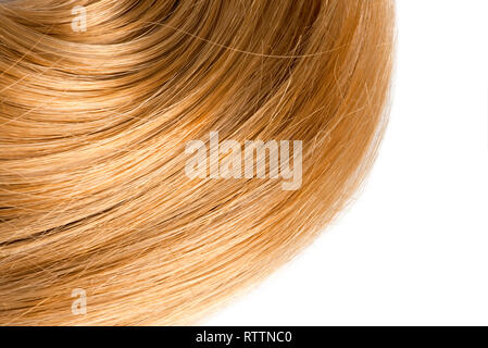 Blondes Haar auf Weiß Stockfoto