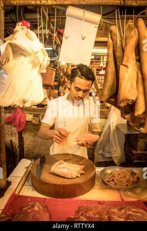 Fleisch Händler in Chow Kit Wet Market, Kuala Lumpur, Malaysia Stockfoto