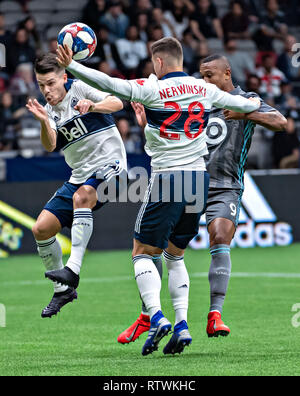 Vancouver, Kanada. 2 Mär, 2019. Vancouver Whitecaps "Victor Giro (L) und Jakob Nerwinski (C) Mias mit Minnesota's United FC Angelo Rodriguez während der MLS Fußball Match zwischen Vancouver Whitecaps und Minnesota United FC in Vancouver, Kanada, 2. März 2019. Whitecaps verloren 2-3. Credit: Andrew Soong/Xinhua/Alamy leben Nachrichten Stockfoto