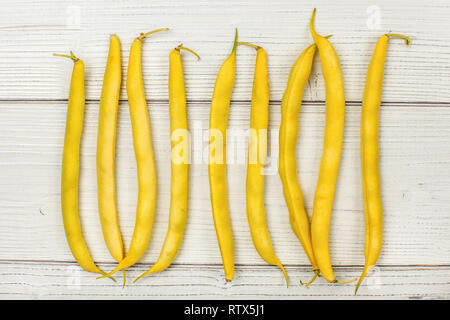 Tischplatte - gelb String (Wachs) Bohnen auf Whiteboards. Stockfoto