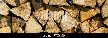 Stückholz pile-Hintergrund Panoramic Image Stockfoto