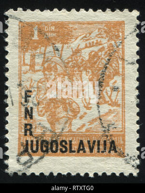 Russland KALININGRAD, 12. NOVEMBER 2016: Briefmarke von Jugoslawien gedruckt, zeigt, Partisanen, ca. 1945 Stockfoto