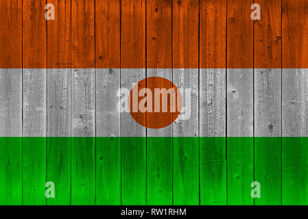Niger Flagge auf alten Laufbelag gemalt. Patriotischen Hintergrund. Nationalflagge von Niger Stockfoto
