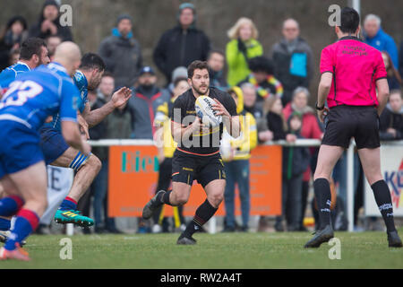 Heidelberg, Deutschland. 02 Mär, 2019. Dritte Match der Rugby Europa Meisterschaft 2019: Germany-Russia am 09.02.2019 in Heidelberg. Morne Laubscher (Deutschland, 21) startet eine neue Bewegung. Credit: Jürgen Kessler/dpa/Alamy leben Nachrichten Stockfoto