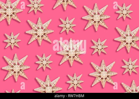 Holiday Star Muster auf rosa Hintergrund - Flach Stockfoto