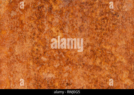 Alte Distressed Brown Terracotta Kupfer Rusty Stein mit groben Textur bunte Einschlüsse. Gebeizt Gradient Grob körnige Oberfläche Stockfoto