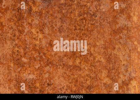 Alte Distressed Brown Terracotta Kupfer Rusty Stein mit groben Textur bunte Einschlüsse. Gebeizt Gradient Grob körnige Oberfläche Stockfoto