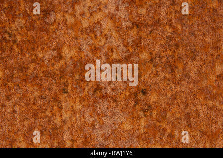 Alte Distressed Brown Terracotta Kupfer Rusty Stein mit groben Textur bunte Einschlüsse. Gebeizt Gradient Grob körnige Oberfläche Stockfoto