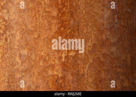 Alte Distressed Brown Terracotta Kupfer Rusty Stein mit groben Textur bunte Einschlüsse. Gebeizt Gradient Grob körnige Oberfläche Stockfoto