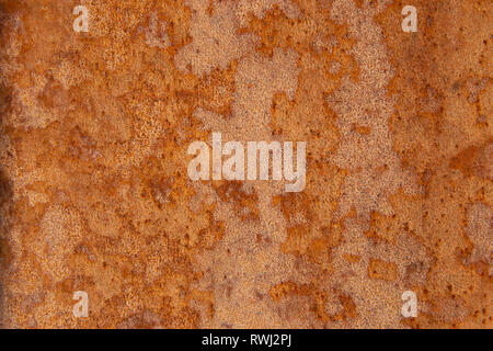 Alte Distressed Brown Terracotta Kupfer Rusty Stein mit groben Textur bunte Einschlüsse. Gebeizt Gradient Grob körnige Oberfläche Stockfoto