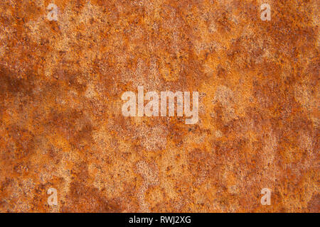 Alte Distressed Brown Terracotta Kupfer Rusty Stein mit groben Textur bunte Einschlüsse. Gebeizt Gradient Grob körnige Oberfläche Stockfoto