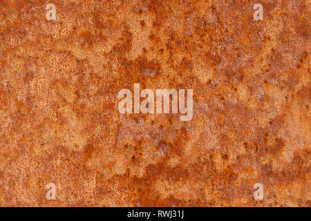 Alte Distressed Brown Terracotta Kupfer Rusty Stein mit groben Textur bunte Einschlüsse. Gebeizt Gradient Grob körnige Oberfläche Stockfoto