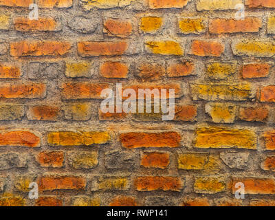 Hintergrund, bestehend aus bunten Steinen. Brick Textur Stockfoto