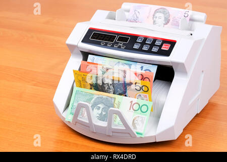 Australische Dollar in eine zählmaschine Stockfoto