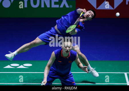 Birmingham. 8 Mär, 2019. Chinas Liu Cheng/Zhang Nan (Vorne) konkurrieren, während die Herren Doppel Viertelfinale Match mit Malaysia's Aaron Chia und Soh Wooi Yik bei den All England Open Badminton Championships 2019 in Birmingham, Großbritannien am 8. März 2019. Credit: Tang Shi/Xinhua/Alamy leben Nachrichten Stockfoto