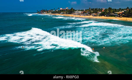 Antenne. Surfer. Hikkaduwa, Sri Lanka. Stockfoto