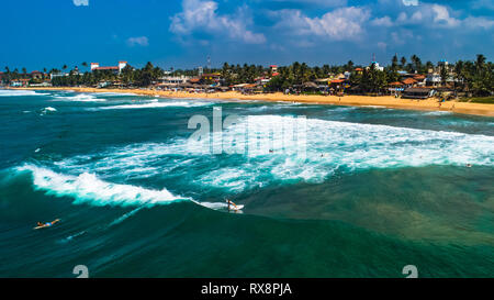 Antenne. Surfer. Hikkaduwa, Sri Lanka. Stockfoto