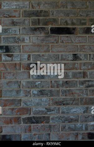 Rot, Orange, Grau, Weiß, und Schwarz Stein Hintergrund Wand Stockfoto