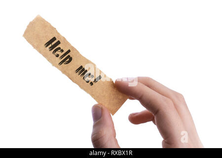 Hilfe Formulierung auf Papier in der Hand in Aussicht Stockfoto