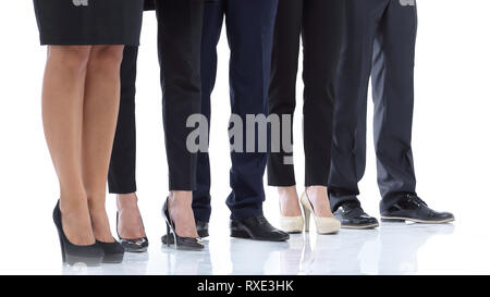 Bis zu schließen. Beine Business Team zusammen. auf weißem isoliert Stockfoto