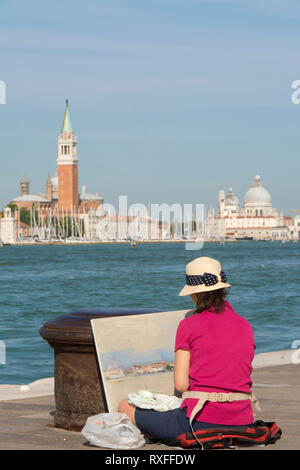 Künstler Malerei Blick auf San Giorgio Maggiore Basilica di Santa Maria della Salute am Zutritt zu den Canal Grande, Venedig, Italien Stockfoto