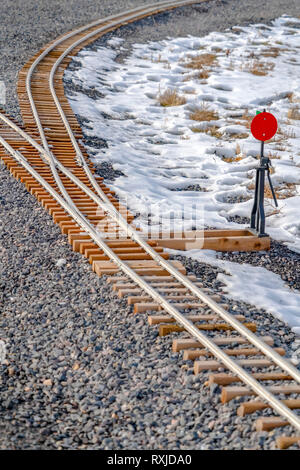 Eisenbahn Switch auf einer Eisenbahn Kreuzung im Winter Stockfoto