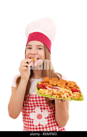 Mädchen kochen isst Chicken Nuggets fast food Stockfoto