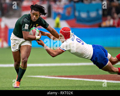 Vancouver, Kanada. 10 Mär, 2019. Stedman Gans (L) von Südafrika und Gabin Villiere Frankreichs konkurrieren im letzten Spiel der HSBC World Rugby sieben Reihe bei BC Place in Vancouver, Kanada, 10. März 2019. Südafrika besiegte Frankreich 21-12 den ersten Platz im Turnier zu nehmen. Credit: Andrew Soong/Xinhua/Alamy leben Nachrichten Stockfoto