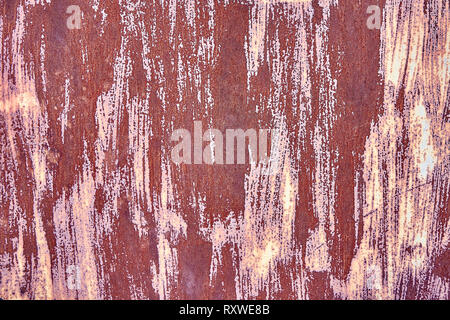 Alte Distressed Brown Terracotta Kupfer Rusty Hintergrund mit groben Textur bunte Einschlüsse. Gebeizt Gradient Grob körnige Oberfläche. Hintergrundbild Stockfoto