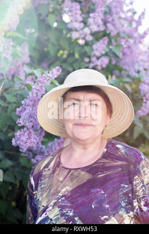 Frau mit Hut Stockfoto