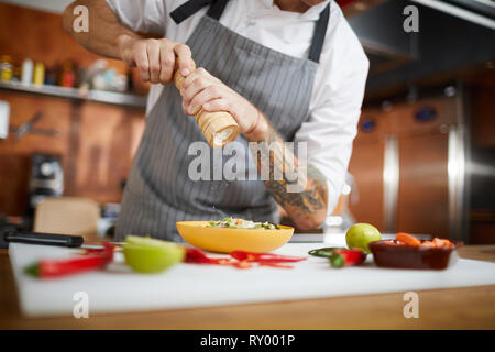 Koch Salzen Dish Stockfoto