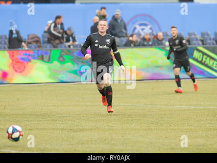 New York, Vereinigte Staaten. 10 Mär, 2019. Wayne Rooney (9) von DC United jagt Kugel während der Mls regelmäßige Spiel gegen NYCFC im Yankee Stadium Spiel endete in der Tabelle mit Platz 2 begnuegen draw Credit: Lev Radin/Pacific Press/Alamy leben Nachrichten Stockfoto