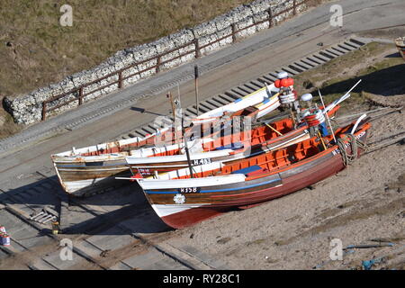 Alten fisch Boote auf dem Sand an der Landung Flamborough Yorkshire UK Stockfoto