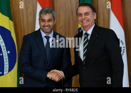 Brasilia, Brasilien. 12 Mär, 2019. DF-Brasilia - 03/12/2019 - Besuch des Präsidenten von Paraguay - Jair Bolsonaro, Präsident der Republik, von Mario Abdo Benitez, Präsident von Paraguay, am Dienstag, 12. März während einer Pressekonferenz mit Mario Abdo Benitez, Präsident von Paraguay, im planalto Palace statt begleitet. Foto: Mateus Bonomi/AGIF AGIF/Alamy Credit: Live-Nachrichten Stockfoto