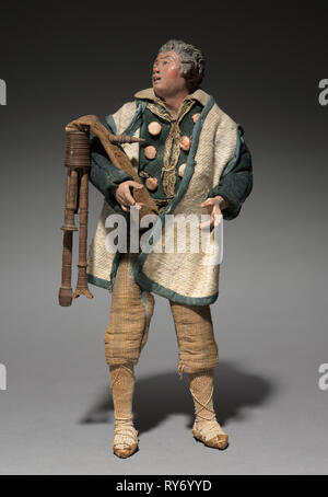 Abbildung aus einer Kinderkrippe: Piper, 1780-1830. Italien, Neapel, Ende des 18. Anfang des 19. Jahrhunderts. Holz und Terracotta mit verschiedenen Textilien gemalt; Insgesamt: 27,3 cm (10 3/4 in Stockfoto