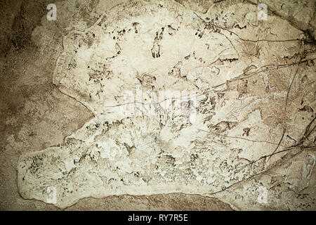 Texturierte Gips-Textur in Braun- und Beigetönen. Dekorative putzstruktur an der Wand - kunst Pinselstrich Hintergrund. Stockfoto