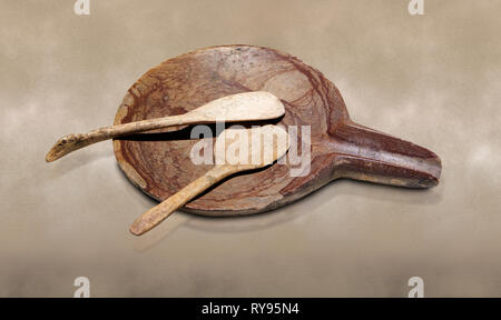 Jungsteinzeit Steinplatte mit langen Auswurfkrümmer und Knochen Löffel. 6000 v. Chr.. Catalhoyuk Sammlungen. Museum für Anatolische Zivilisationen in Ankara Stockfoto