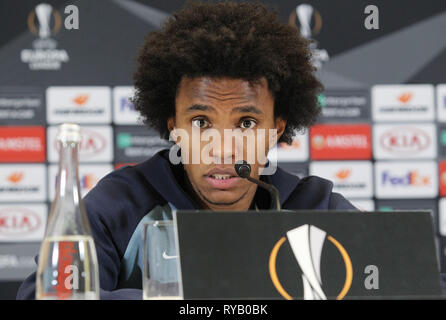 Kiew, Ukraine. 13 Mär, 2019. Chelsea Spieler William spricht während einer Pressekonferenz in Kiew, Ukraine, am 13. März 2019. Chelsea wird Dynamo Kiew Gesicht in der UEFA Europa League, zweite Bein Fußball Match in Kiew am 14. März 2019. Credit: Serg Glovny/ZUMA Draht/Alamy leben Nachrichten Stockfoto