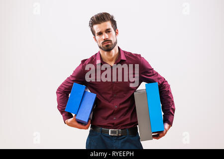 Porträt der jungen Geschäftsmann, unmotiviert ist und überarbeitet. Stockfoto